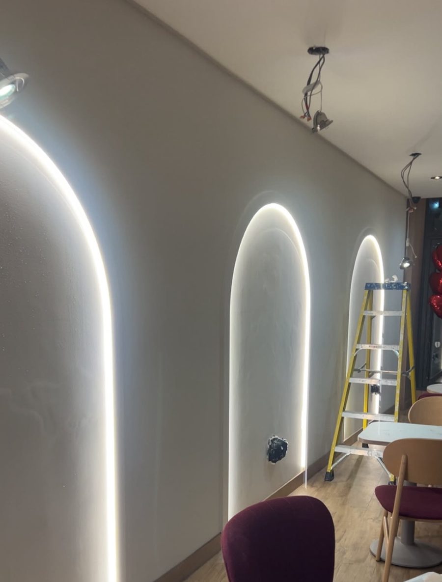 Illuminated LED arch lighting in a commercial premises